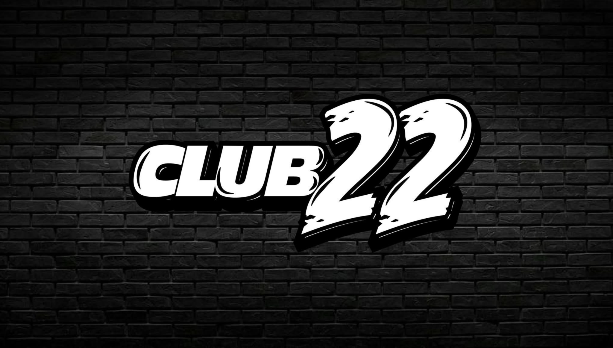 Official Club22 logo on a black brick wall